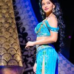 Desmonda Cathabel as Princess Jasmine, looking over her shoulder.