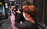 A group of young adults filming backstage at Mayflower Theatre.