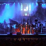 Anything For Love stage, gothic backdrop to symphonic rock orchestra centring on three black clad singers