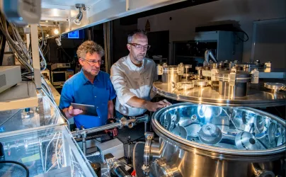 Jeremy Frey and Bill Brockleby observing nanoscale imaging of neurons equipment