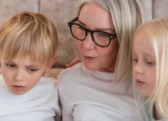 Pexels image of a grandmother chatting with her grandchildren