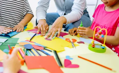 Children playing with toys and arts and crafts